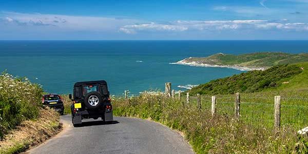 Jeep driving to beach